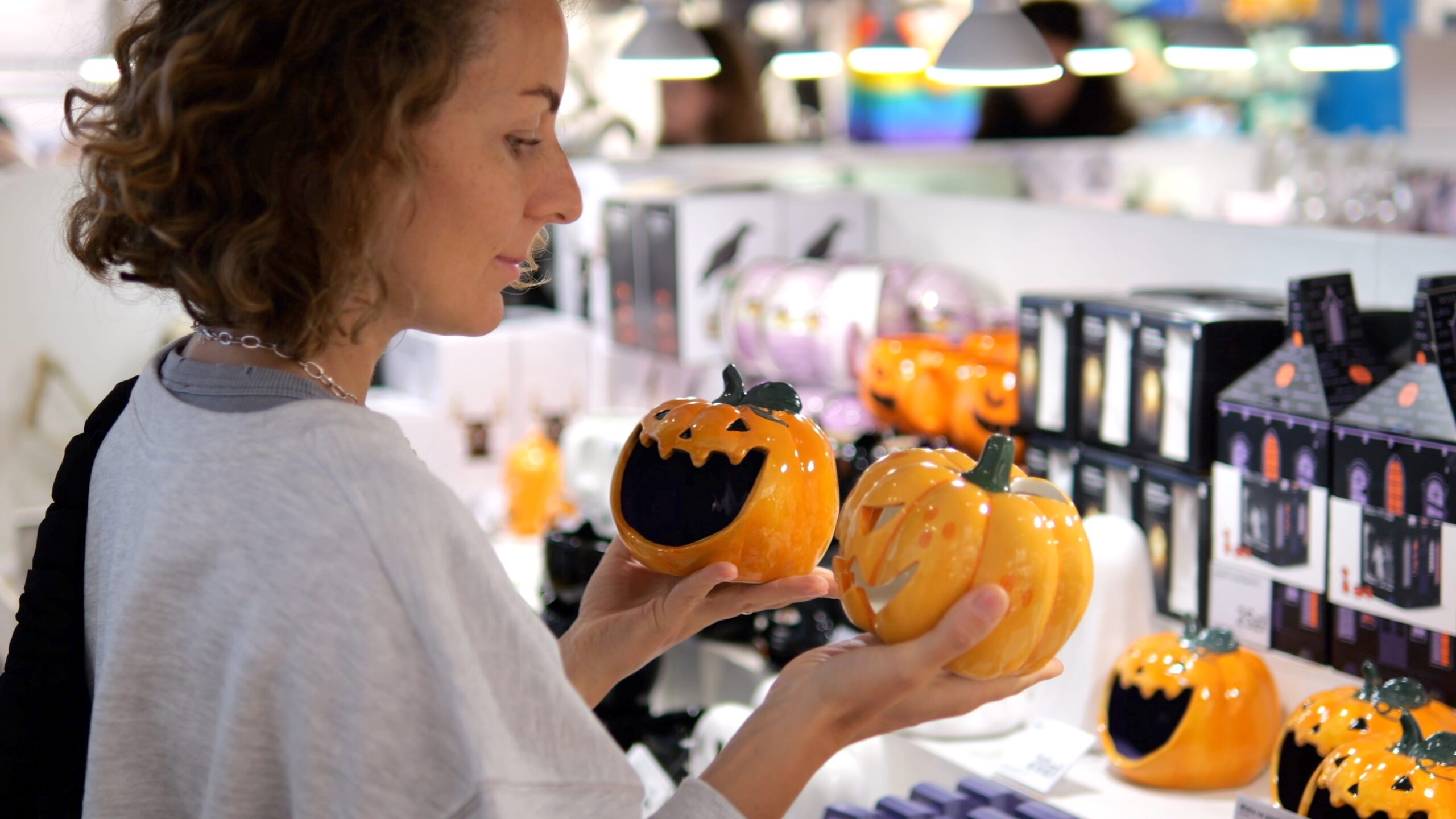 Woman shopping for halloween decor